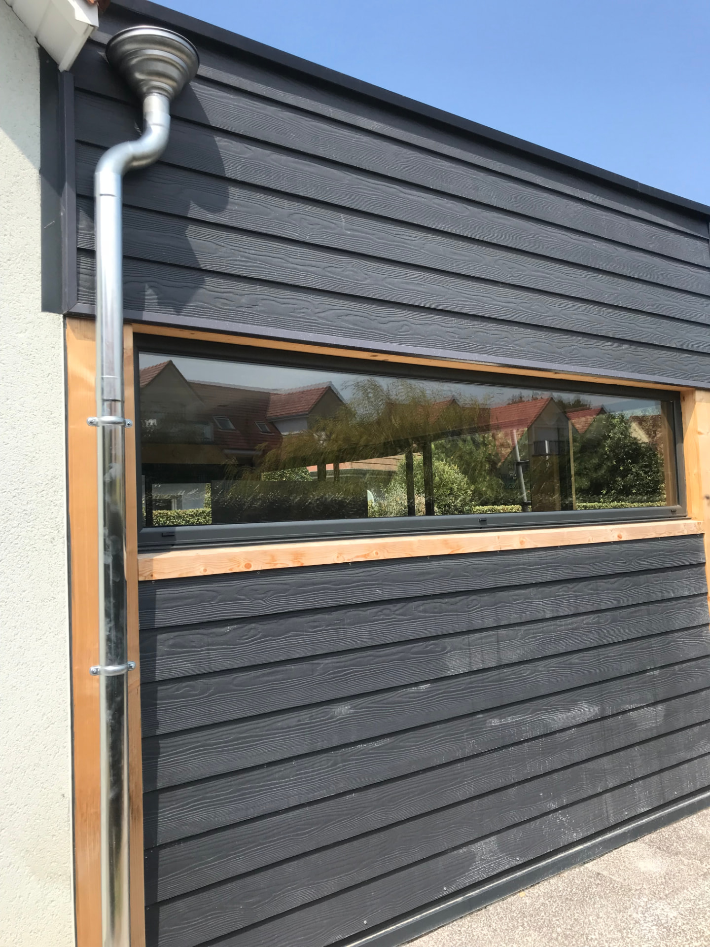 Bardage anthracite | Isolation extérieure et bardage bois par Opal Étanchéité